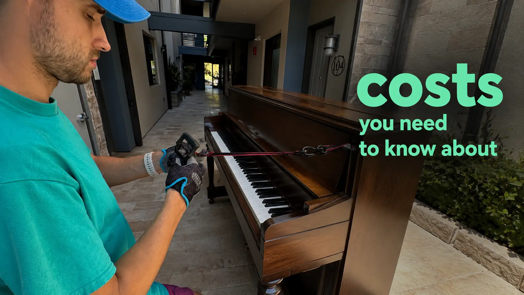 Mover strapping an upright piano - how much does it cost to move a piano